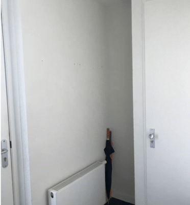 Schoenenkast in hal Schoenenkast in hal